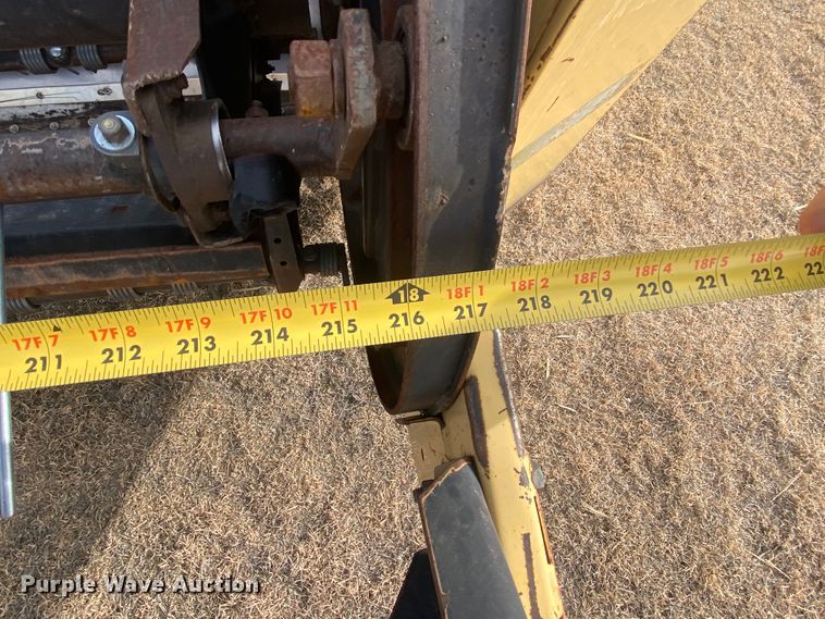 image for item DL1286 2001 New Holland HW320  windrower