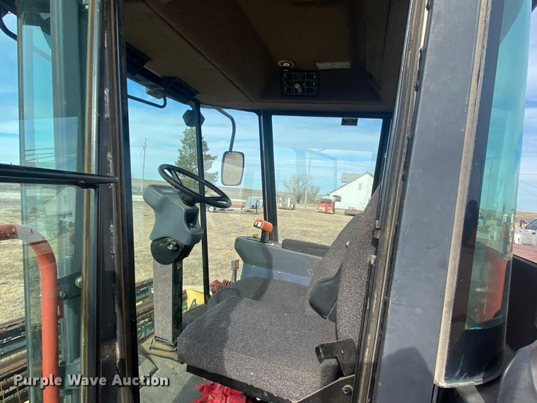 image for item DL1286 2001 New Holland HW320  windrower