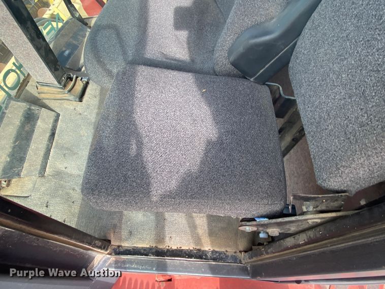 image for item DL1286 2001 New Holland HW320  windrower