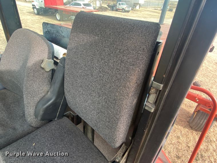 image for item DL1286 2001 New Holland HW320  windrower