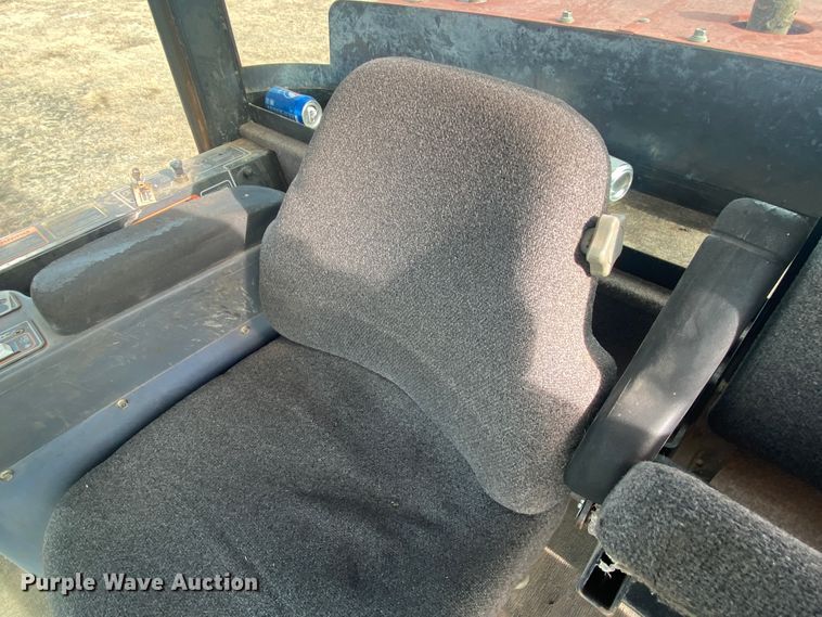 image for item DL1286 2001 New Holland HW320  windrower