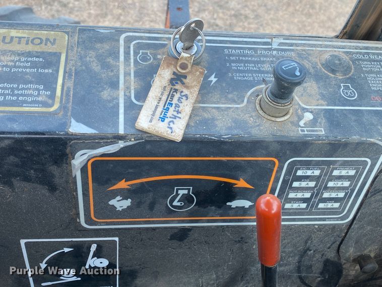 image for item DL1286 2001 New Holland HW320  windrower