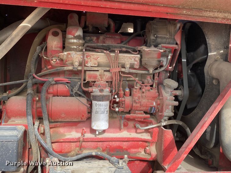 image for item DL1286 2001 New Holland HW320  windrower