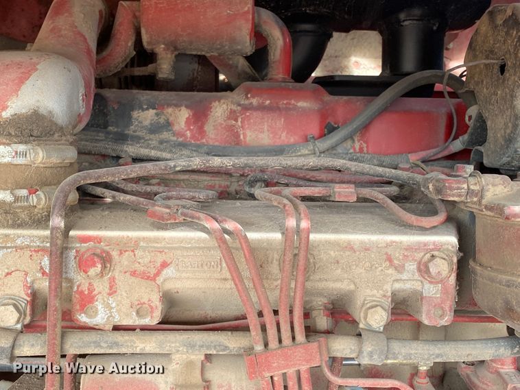 image for item DL1286 2001 New Holland HW320  windrower