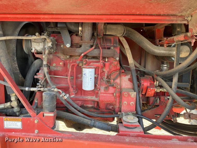 image for item DL1286 2001 New Holland HW320  windrower