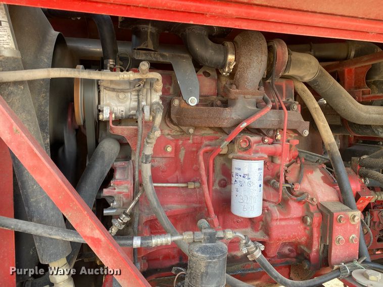 image for item DL1286 2001 New Holland HW320  windrower