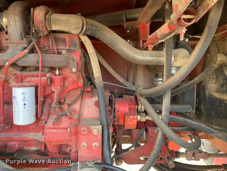 image for item DL1286 2001 New Holland HW320  windrower