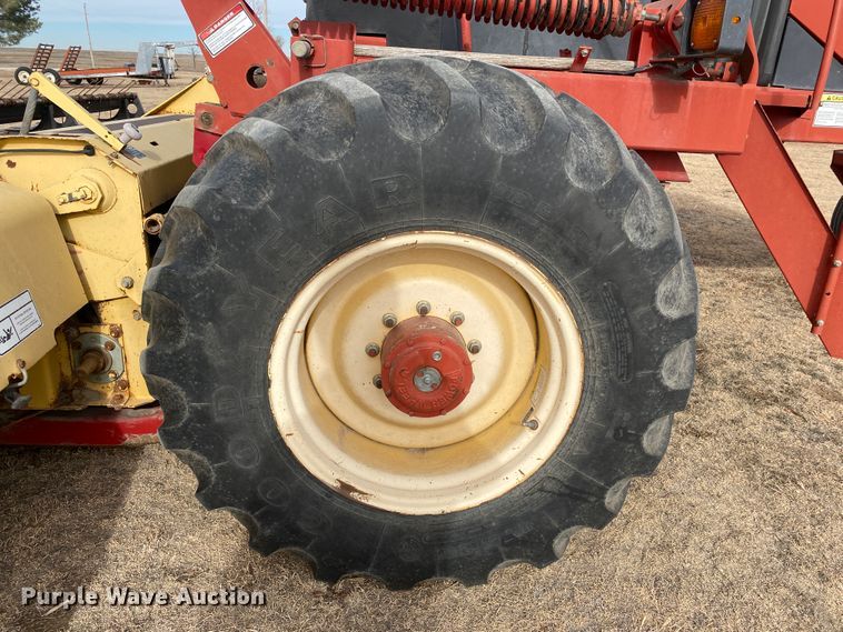 image for item DL1286 2001 New Holland HW320  windrower