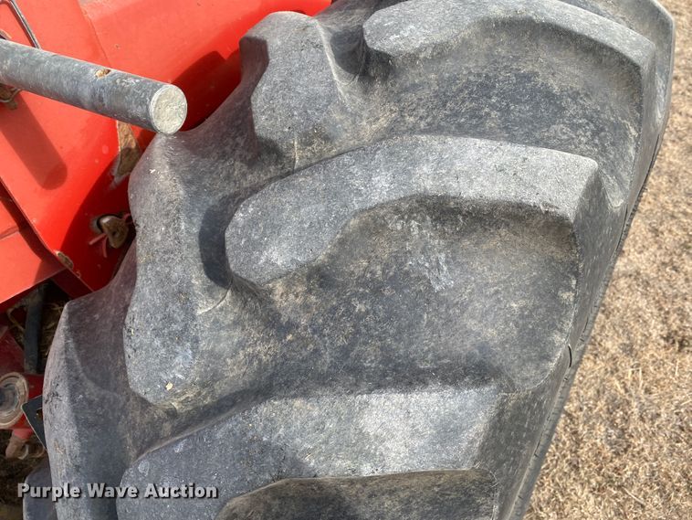 image for item DL1286 2001 New Holland HW320  windrower