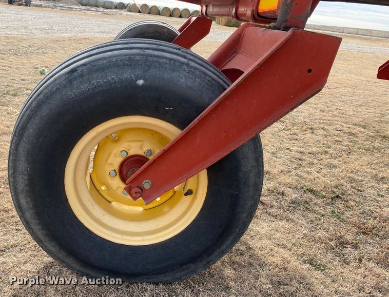 image for item DL1286 2001 New Holland HW320  windrower