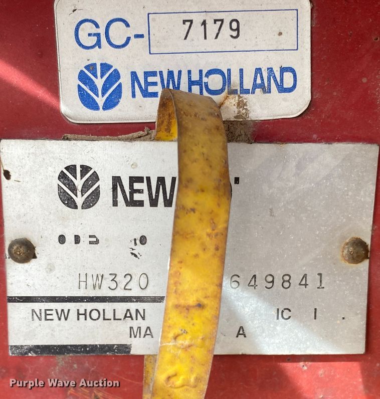 image for item DL1286 2001 New Holland HW320  windrower