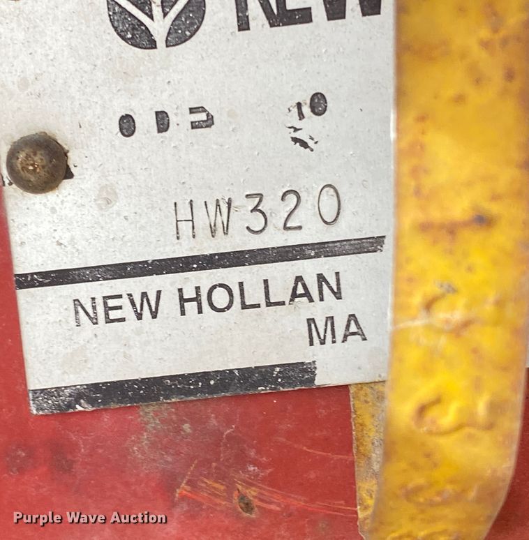 image for item DL1286 2001 New Holland HW320  windrower