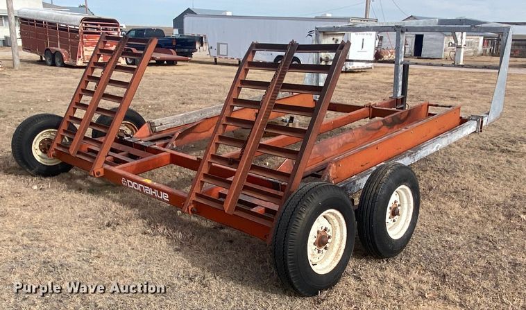 image for item DL1286 2001 New Holland HW320  windrower