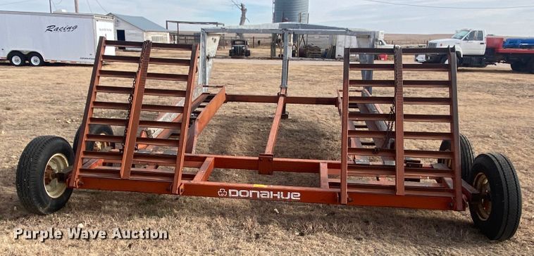 image for item DL1286 2001 New Holland HW320  windrower