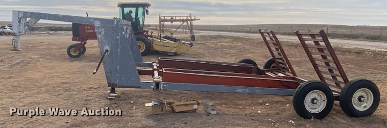 image for item DL1286 2001 New Holland HW320  windrower