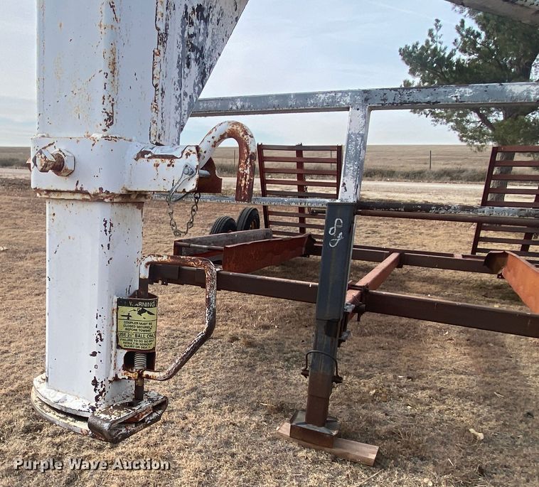 image for item DL1286 2001 New Holland HW320  windrower