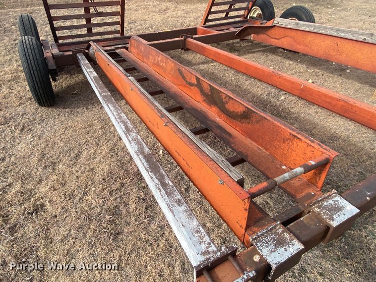 image for item DL1286 2001 New Holland HW320  windrower