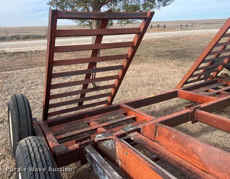 image for item DL1286 2001 New Holland HW320  windrower