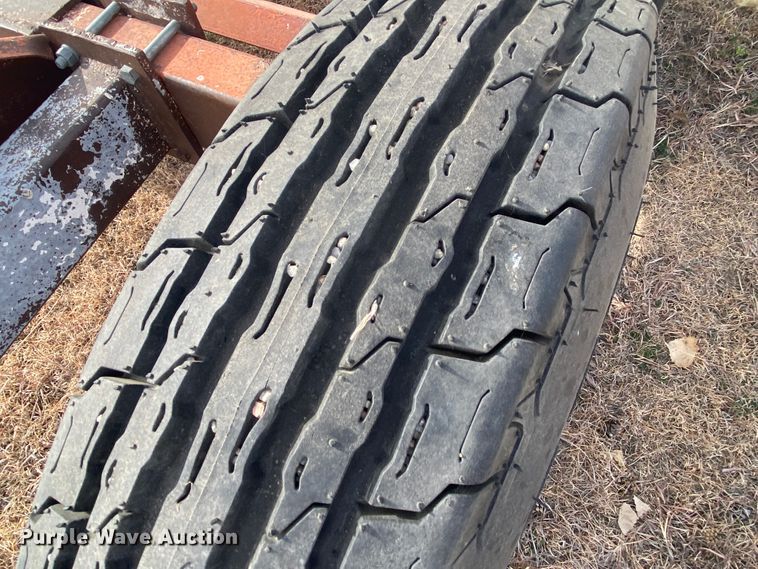 image for item DL1286 2001 New Holland HW320  windrower