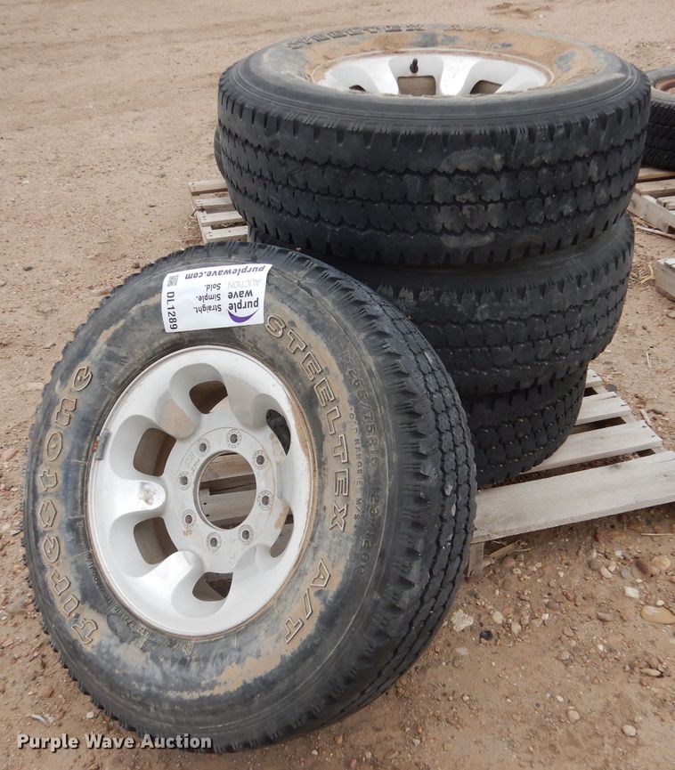 image for item DL1289 (4) Firestone Steeltex A/V LT265/75R16 tires and wheels