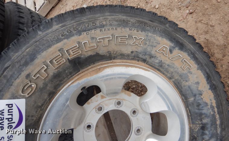 image for item DL1289 (4) Firestone Steeltex A/V LT265/75R16 tires and wheels