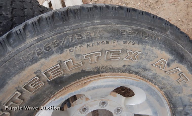 image for item DL1289 (4) Firestone Steeltex A/V LT265/75R16 tires and wheels