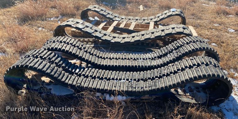 image for item DL1349 (2) sets of skid steer tracks