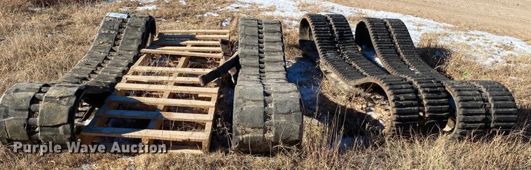 image for item DL1349 (2) sets of skid steer tracks
