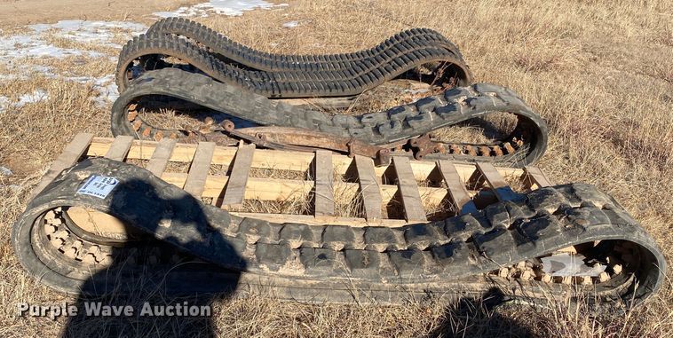 image for item DL1349 (2) sets of skid steer tracks