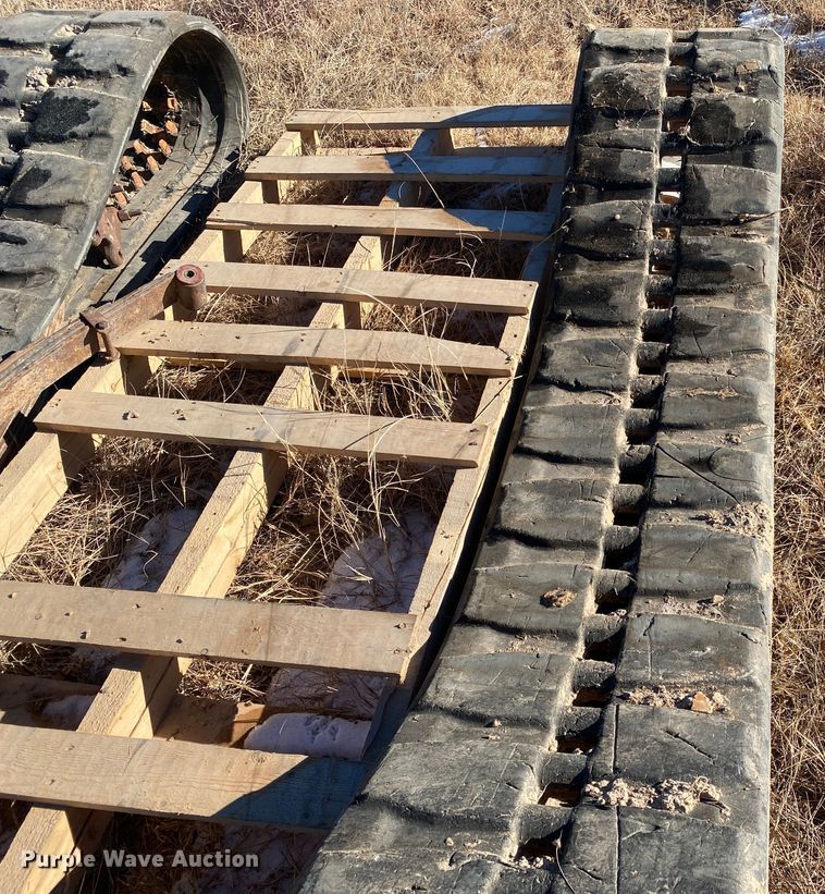 image for item DL1349 (2) sets of skid steer tracks