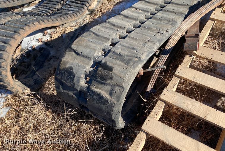 image for item DL1349 (2) sets of skid steer tracks