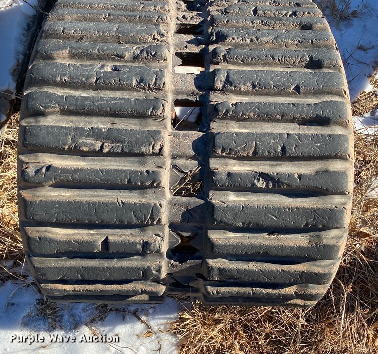 image for item DL1349 (2) sets of skid steer tracks