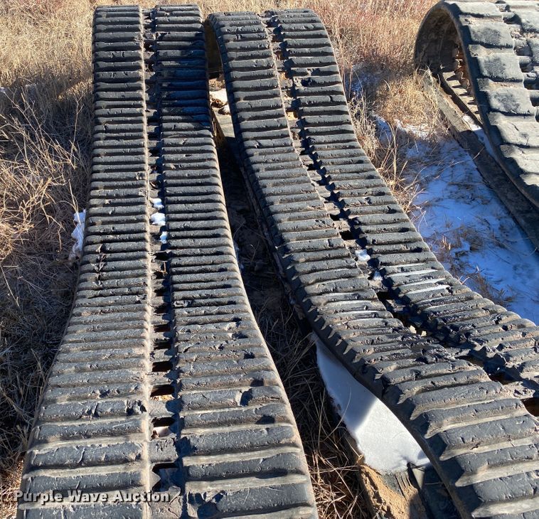 image for item DL1349 (2) sets of skid steer tracks