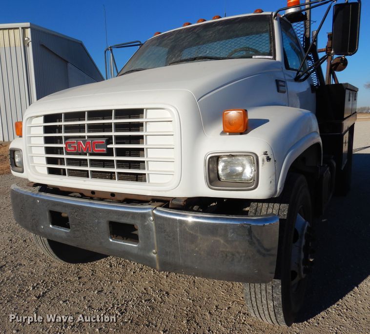 image for item JJ9832 1997 GMC C7500  flatbed truck