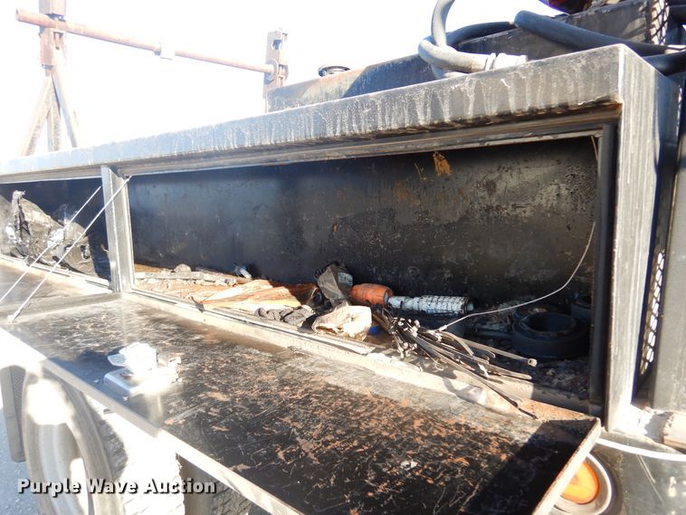 image for item JJ9832 1997 GMC C7500  flatbed truck