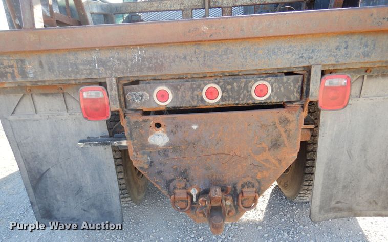 image for item JJ9832 1997 GMC C7500  flatbed truck