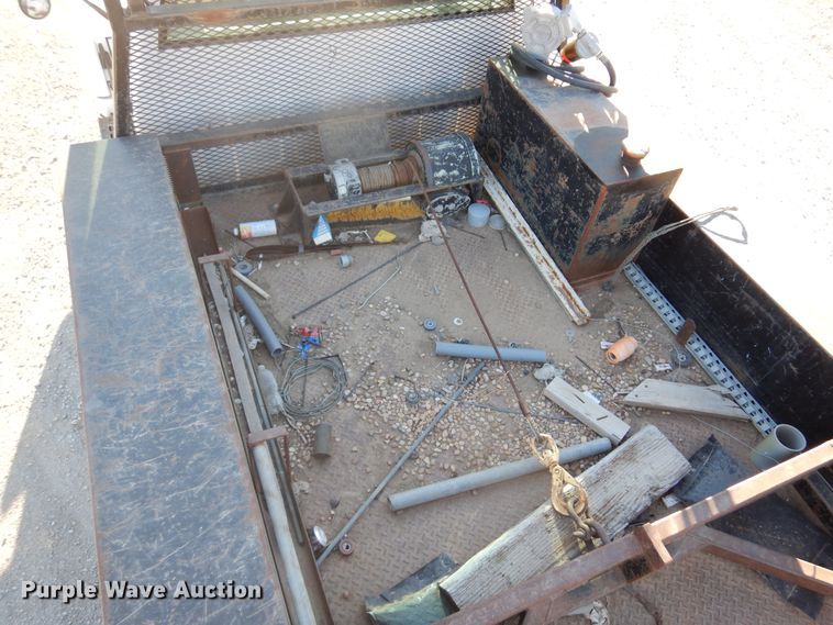 image for item JJ9832 1997 GMC C7500  flatbed truck