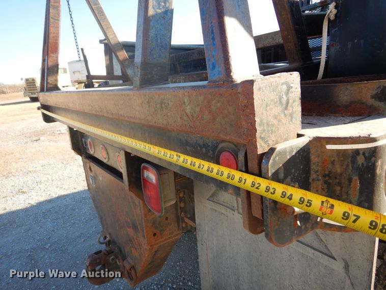 image for item JJ9832 1997 GMC C7500  flatbed truck