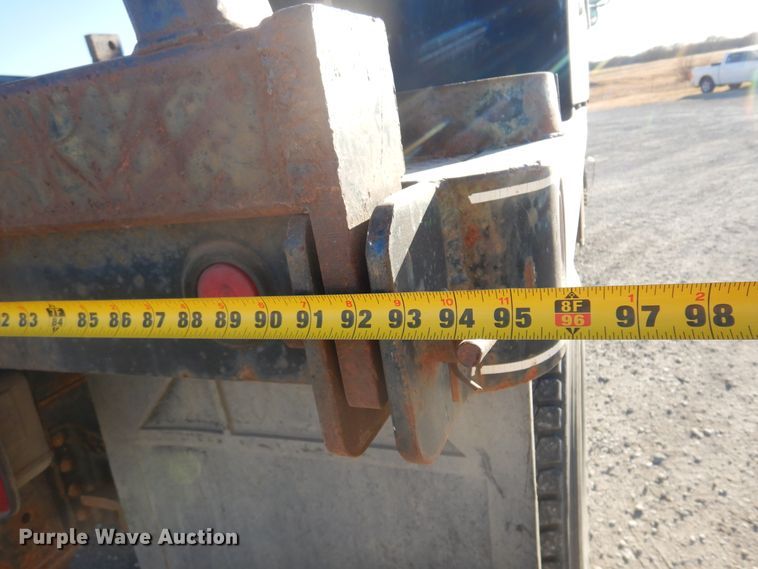 image for item JJ9832 1997 GMC C7500  flatbed truck