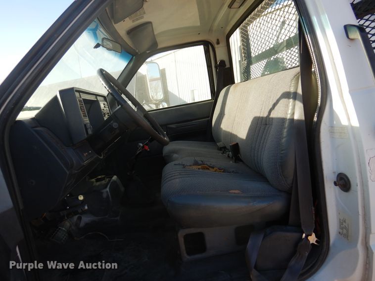 image for item JJ9832 1997 GMC C7500  flatbed truck