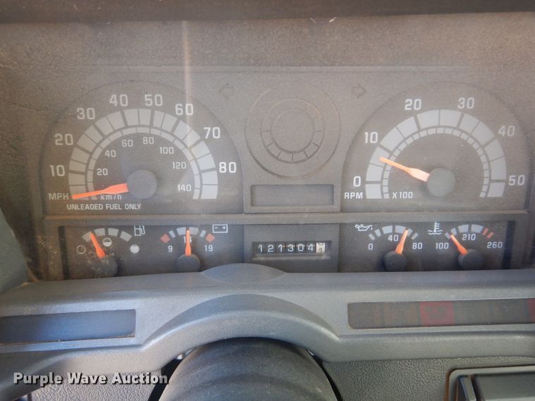 image for item JJ9832 1997 GMC C7500  flatbed truck