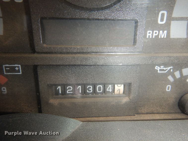 image for item JJ9832 1997 GMC C7500  flatbed truck