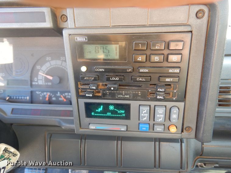 image for item JJ9832 1997 GMC C7500  flatbed truck