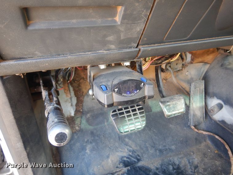 image for item JJ9832 1997 GMC C7500  flatbed truck