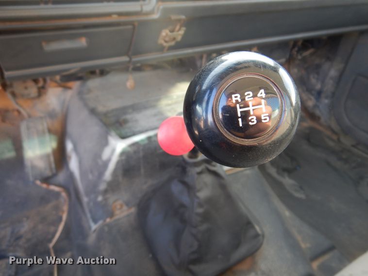 image for item JJ9832 1997 GMC C7500  flatbed truck