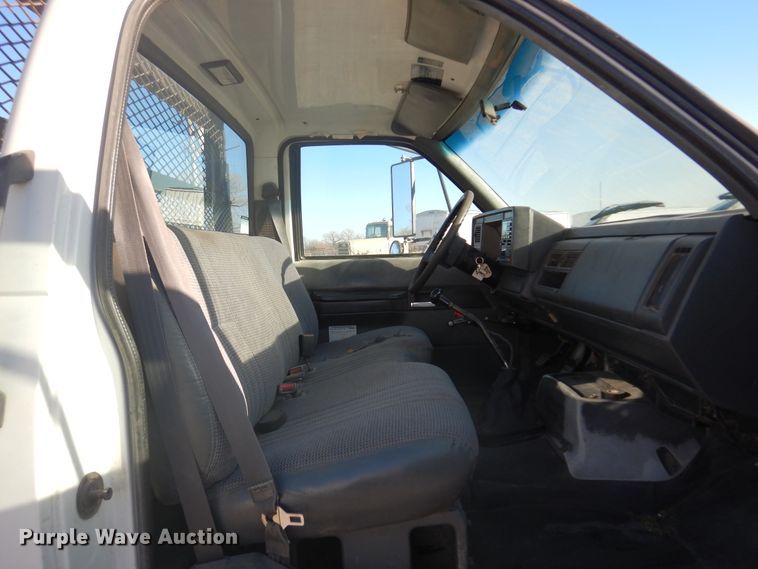 image for item JJ9832 1997 GMC C7500  flatbed truck