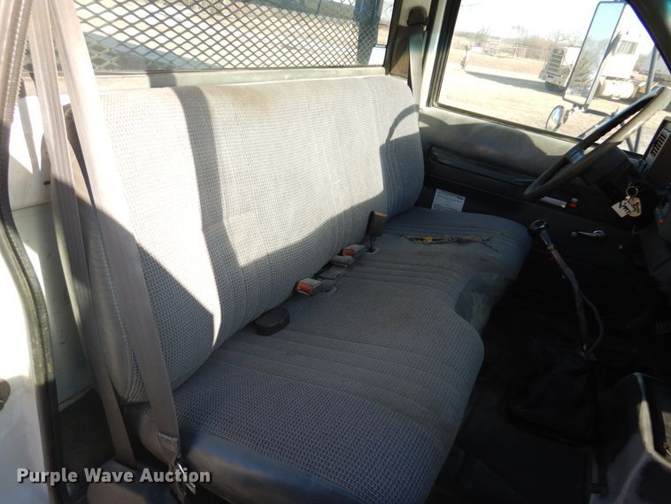 image for item JJ9832 1997 GMC C7500  flatbed truck