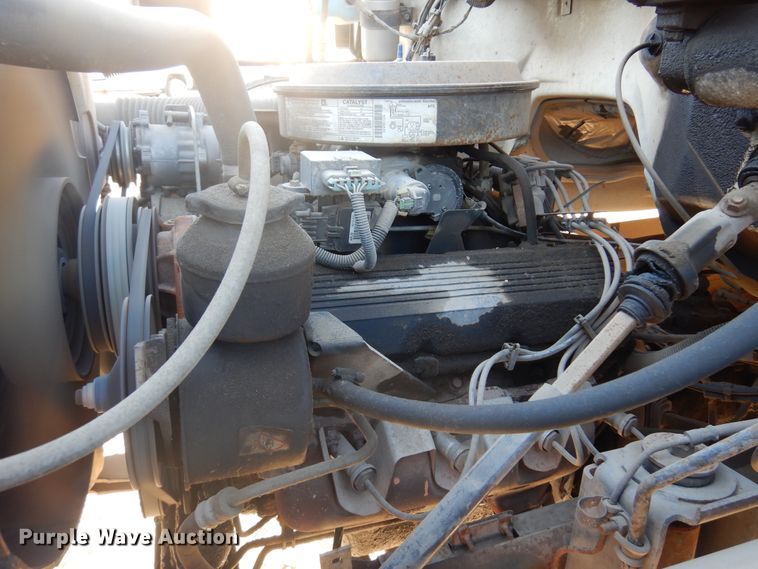 image for item JJ9832 1997 GMC C7500  flatbed truck