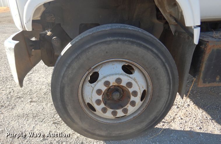 image for item JJ9832 1997 GMC C7500  flatbed truck