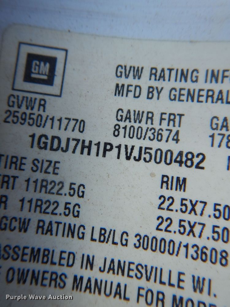 image for item JJ9832 1997 GMC C7500  flatbed truck